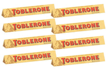 Load image into Gallery viewer, TOBLERONE SWISS MILK CHOCOLATE WITH HONEY AND ALMOND NOUGAT, 6 Count of 3.52 oz bar, 21.12 oz